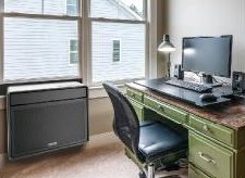 In-window heat pump installed in a home office
